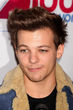 Louis Tomlinson steht auf Tattoos