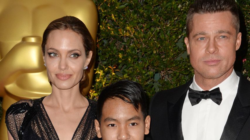 Angelina Jolie und Brad Pitt mit Sohn Maddox im Jahr 2013