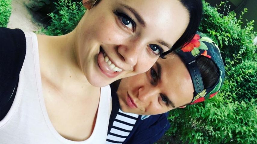 Anne Wünsche und Henning Merten mit ihrer Tochter