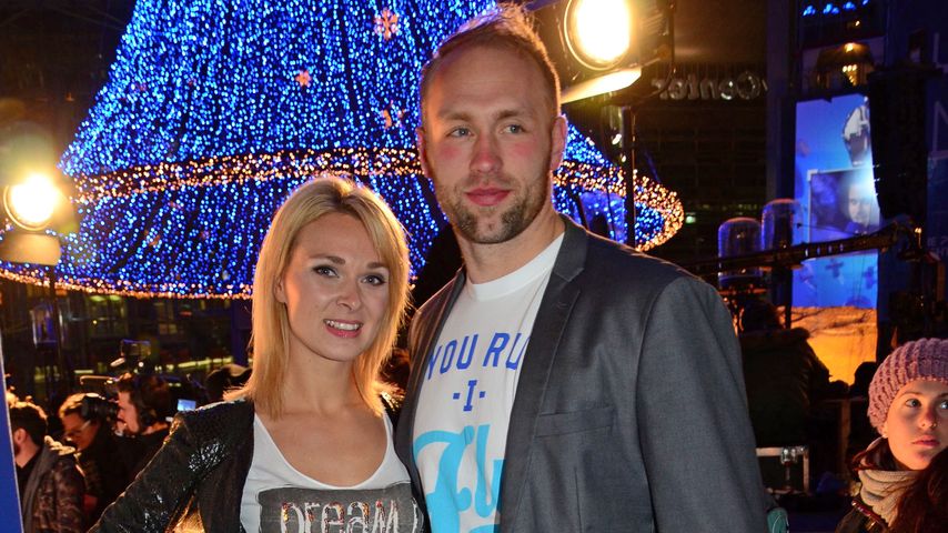 Britta Hofmann mit Diskuswerfer Robert Harting
