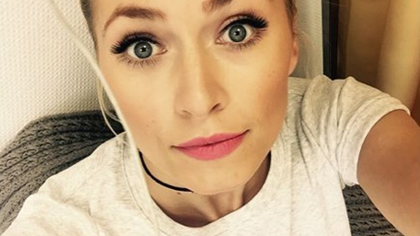 Lena Gercke mit geflochtenem Zopf
