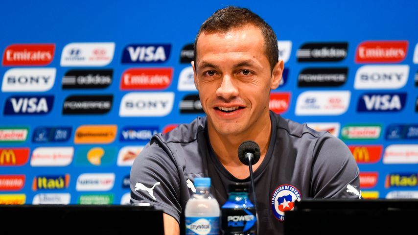Marcelo Diaz bei einer Pressekonferenz 2014