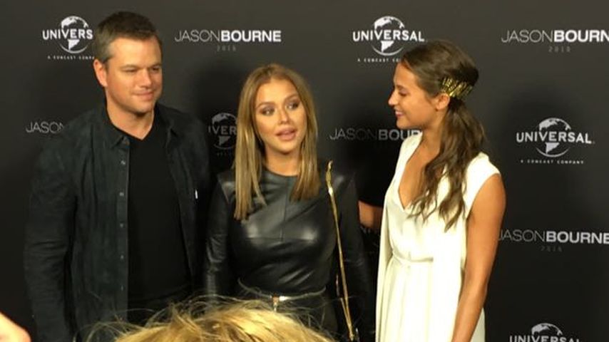 Matt Damon, Kim Gloss und Alicia Vikander im Juli 2016