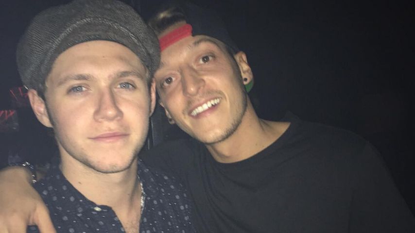 Fußballer Mesut Özil und Sänger Niall Horan
