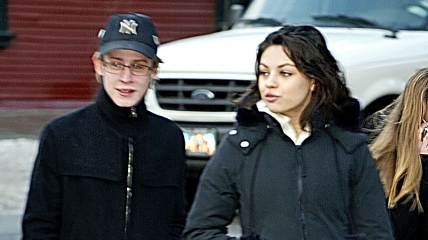 Mila Kunis und Macaulay Culkin im Jahr 2004