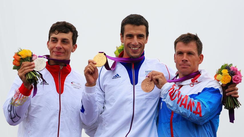 Sideris Tasiadis (l.), Tony Estanguet (m.) und Michal Martikan
