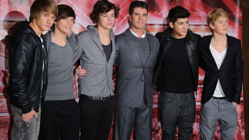 Simon Cowell (m.) mit One Direction
