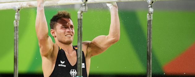 Andreas Bretschneider beim Turnen am Reck bei Olympia 2016 Andreas Bretschneider beim Turnen am Reck bei Olympia 2016