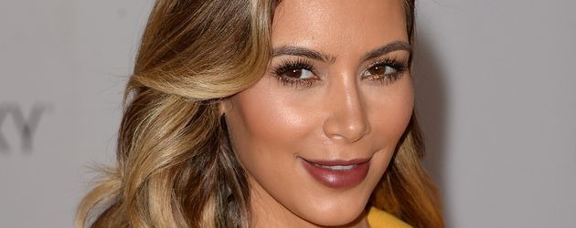 Kim Kardashian auf dem roten Teppich in Beverly Hills, 2013 Kim Kardashian auf dem roten Teppich in Beverly Hills, 2013