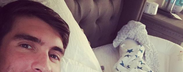 Michael Phelps mit Söhnchen Boomer Michael Phelps mit Söhnchen Boomer