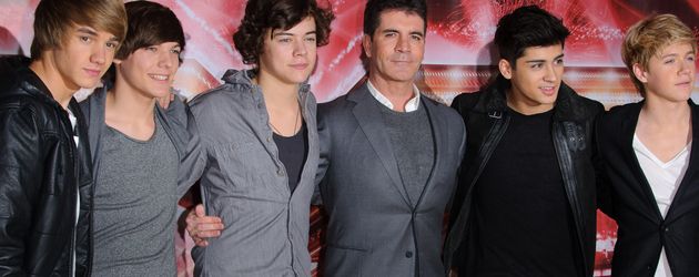 Simon Cowell (m.) mit One Direction Simon Cowell (m.) mit One Direction