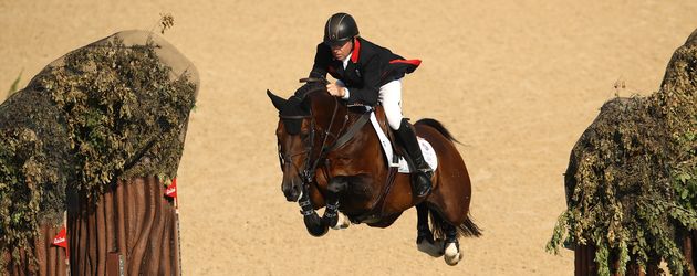Olympia-Sieger Nick Skelton und sein Pferd Big Star Olympia-Sieger Nick Skelton und sein Pferd Big Star